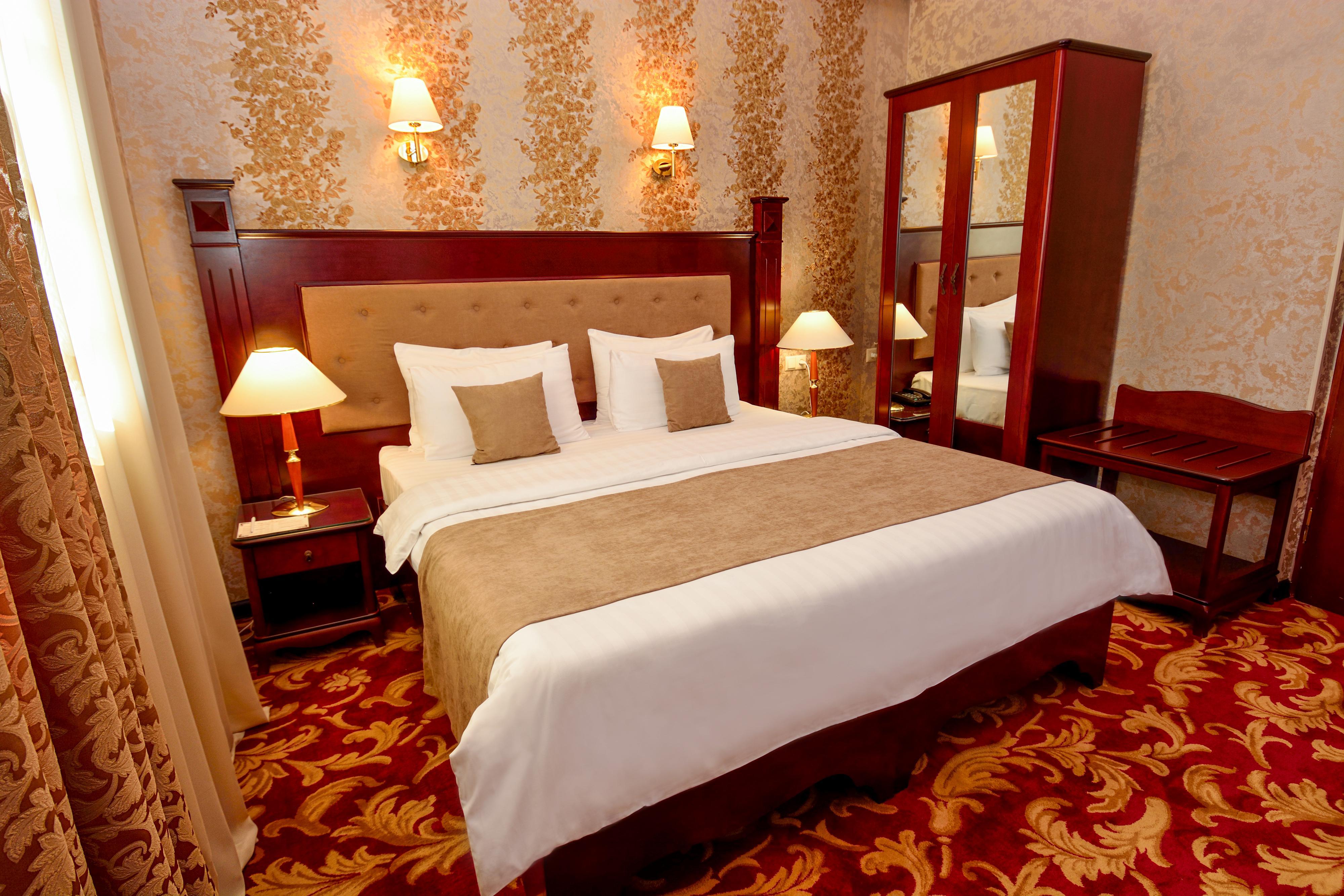 리버 사이드 호텔 츠빌리시 트빌리시 외부 사진 A bedroom in the hotel